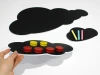 Magnetic chalkboard for kids with cloud design, colorful magnets, and crayons.