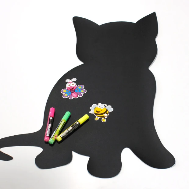 Magnetic chalkboard for kids in cat shape with insect stickers and colorful markers.