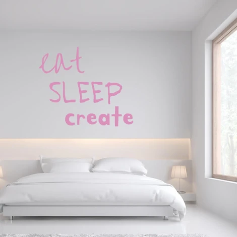 Wall sticker "Eat sleep create 2423" - Bedroom decor with light-colored walls and minimalist furniture.