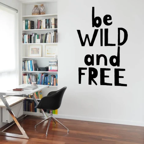 Wall sticker with the phrase Be wild and free 2422 - Office decor. Light-colored walls, wooden floor, shelf.