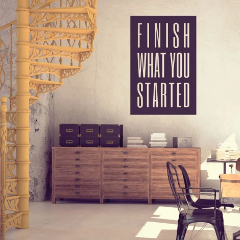 Painting template with the phrase "Finish what you started" - Office decor. Light-colored walls and furniture.