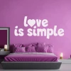 Love is simple 2431 painting template - Bedroom design with purple walls and a bed with matching pillows.