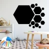 Chalkboard hexagon stickers for kids - Bright room decor with light walls and natural furniture.