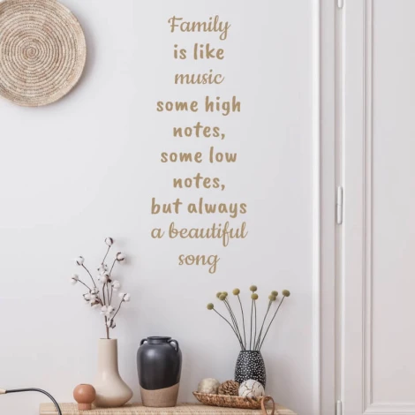 Wall sticker with the quote "Family is like music" 2435 - Living room decor with light walls and minimalist furniture.