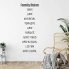 Wall sticker Family Rules 2434 - Living room decor with light walls, wooden floor, and plants.
