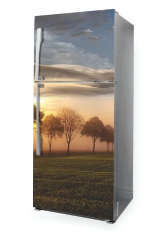Fridge wrap sticker P1085 - Graphic design featuring trees against a sunset backdrop and grass.