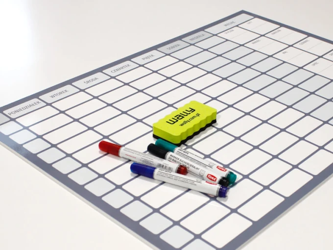 Weekly dry-erase planner with annual planner 267 - Graphic design. Rectangular layout with grid fields and headers.