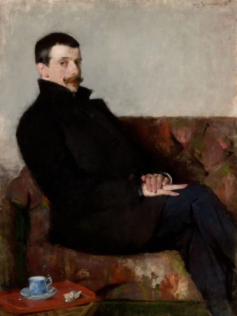 Reproduction by Paul Neuen, Olga Boznańska - Living room arrangement with muted walls and a dark sofa.