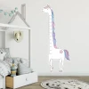 Unicorn growth chart sticker for kids\' room. Bright wall colors and stylish furniture.
