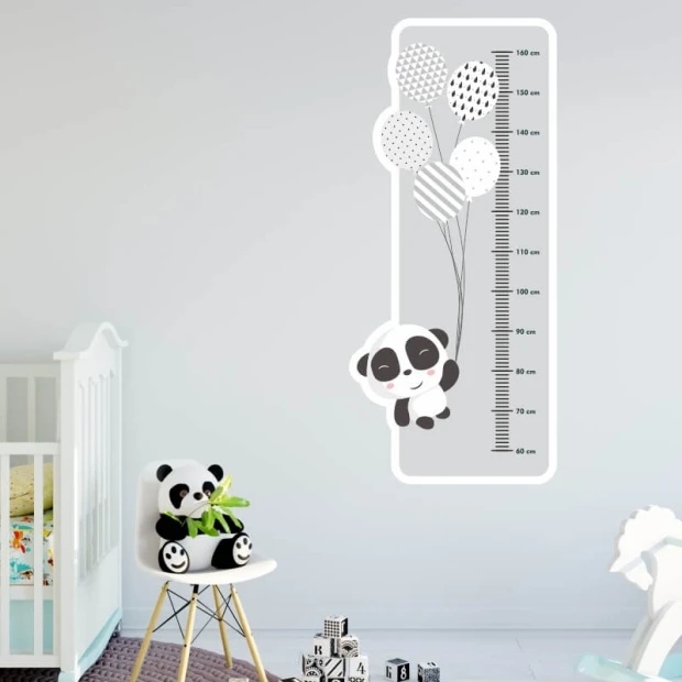 Panda growth chart sticker for kids\' room. Bright wall colors and stylish furniture create a cheerful atmosphere.