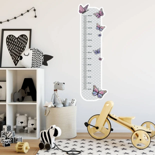 Pastel butterfly growth chart sticker for kids, perfect for a cozy nursery.