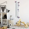 Pastel butterfly growth chart sticker for kids, perfect for a cozy nursery.