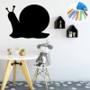 Chalk sticker for kids, snail design - Decorates a child\'s room with light-colored walls and natural wood furniture.