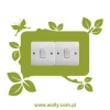Stylish outlet sticker 1109 with delicate leaves, perfect for a modern interior with a natural touch.