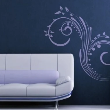 Stylish floral sticker 0799 in soft shades on a dark blue wall in a modern living room.