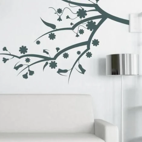 Elegant branch-shaped sticker with delicate flowers, perfect for a stylish living room.