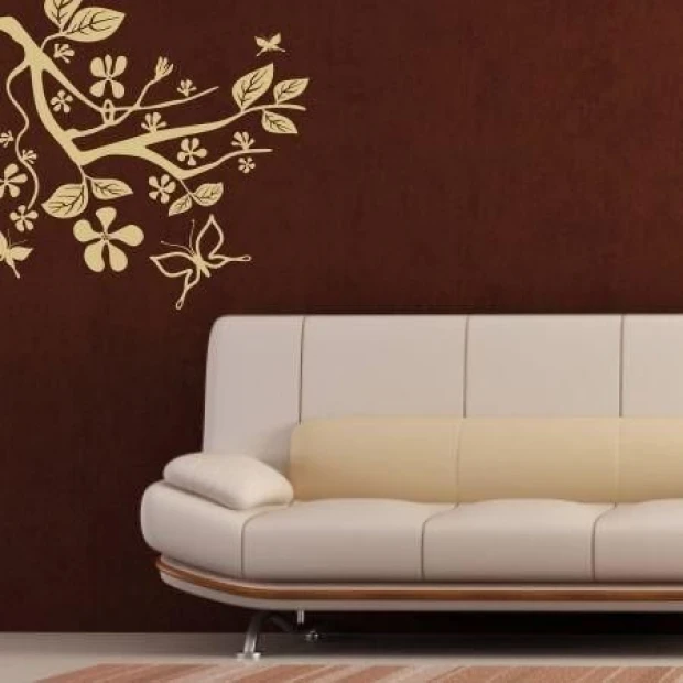 Elegant branch sticker 1033 in beige shades perfectly complements a modern living room, adding a touch of style.