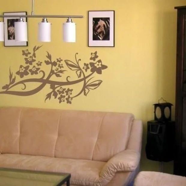 Delicate floral sticker 0906 in a warm, modern living room, adding charm and freshness to the walls.