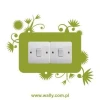 Sticker for outlet 1117, adorned with delicate plant motifs, perfect for modern interiors.