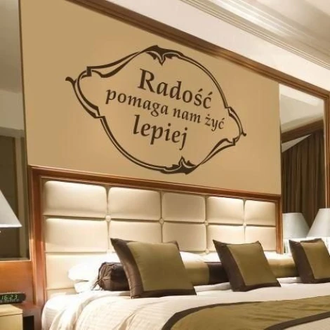 Stylish sticker with the quote "Joy helps us live better," perfect for adding warmth to an elegant bedroom.