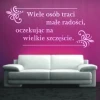 Inspirational quote sticker 1257 in a modern living room, adding a stylish touch to a purple wall.