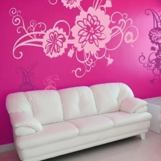 Colorful flower sticker 1193 will beautifully enhance a modern living room with a pink wall and white sofa.