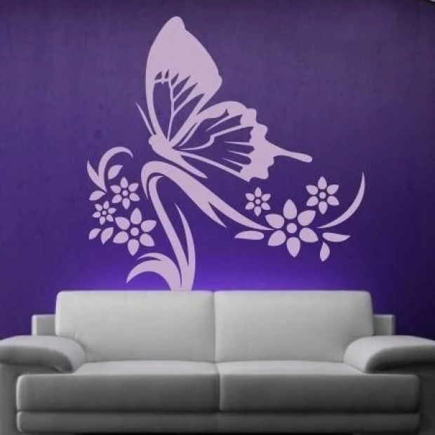 Butterfly in flowers 1249 in a modern living room on a purple wall adds lightness and a pop of color.
