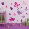 Multicolored pastel butterfly sticker, perfect for a child\'s room, adding joy and charm.