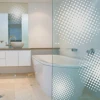 Abstract sticker 0788 in a modern bathroom, adding lightness and style with subtle white elements.