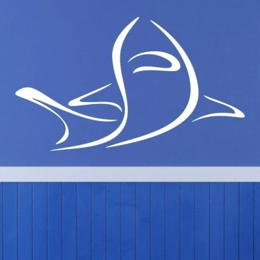 Stylish white shark sticker, perfect for a child\'s room, against a blue wall.