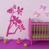 Butterfly branch painting template 1240 - Decor for a child\'s room. Light-colored walls, furniture in vibrant pink.