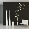 Delicate floral and butterfly painting template in a modern interior, perfect for minimalist spaces.