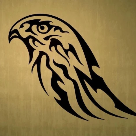 Stylish hawk sticker in black shades on a gold background, perfect for modern interiors.