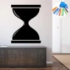 Chalkboard sticker hourglass 332 - Room decor with light walls and dark furniture.