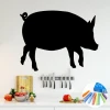 Chalkboard pig sticker 353 - Kitchen decor with light-colored walls, minimalist furniture, and accessories.