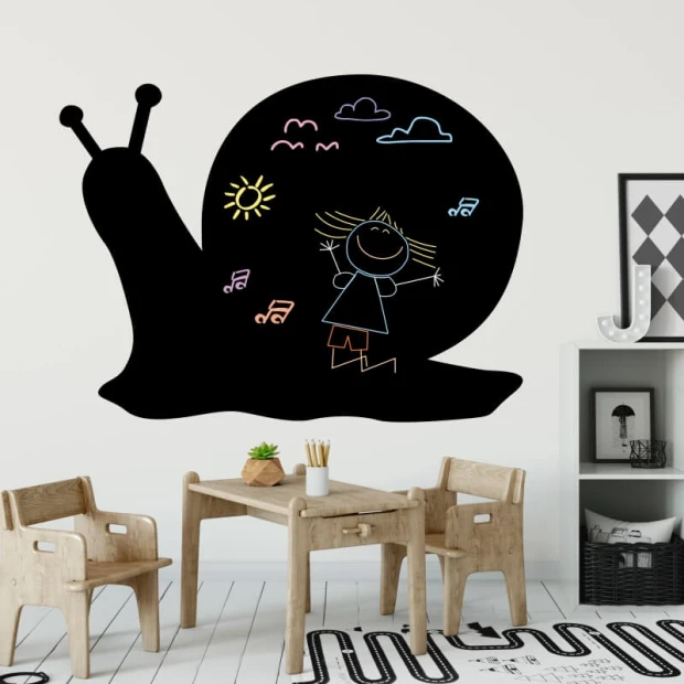 Chalkboard magnetic board snail 298 - Decor for a child\'s room with light-colored walls and natural furniture.