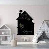 Chalkboard magnetic board house 262 - Decor in a children\'s room with light-colored walls and Scandinavian-style furniture.