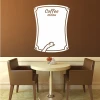 Dry-erase board coffee menu 253 - Café decor with brown walls and dark brown furniture.