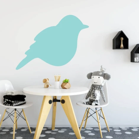 Dry-erase board bird 229 - Dining room setup. Light walls, natural wood table, white chairs.