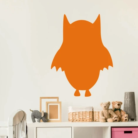 Owl dry-erase board 220 - Decorated in a children\'s room with light-colored walls, simple furniture, and toys.