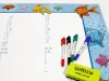 Magnetic dry-erase writing board 024 - Features colorful fish and letters in a graphic design.