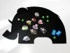 Magnetic chalkboard for kids in the shape of an elephant with colorful magnets.