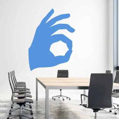 Dry-erase board hand 352 - Office setup with light-colored walls and modern gray furniture.