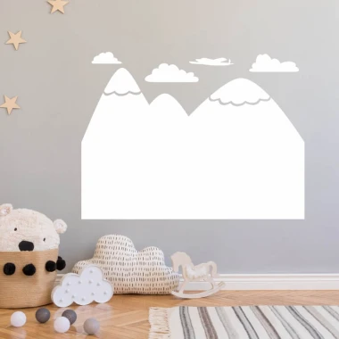 Dry-erase board mountains 285 - Decor in a child\'s room. Light-colored walls, wooden floor, soft toys.