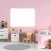 Heart-shaped whiteboard 287 - Decor in a children\'s room with pink walls and light-colored furniture.