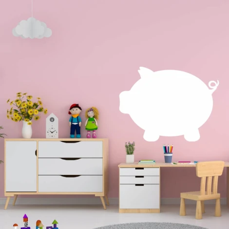 Dry-erase board piggy bank 306 - Decorated in a child\'s room with pink walls and light furniture.