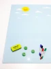 Dry-erase magnetic board for kids featuring a sun and clouds design on a blue background.