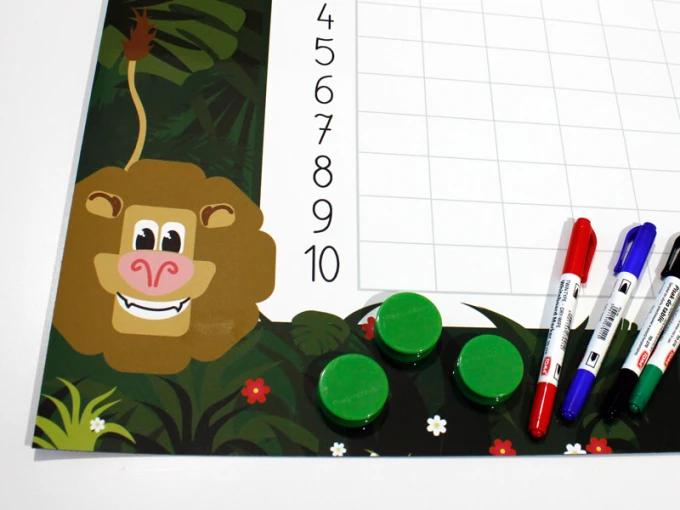 Magnetic dry-erase multiplication chart 030 - Features a smiling lion design.