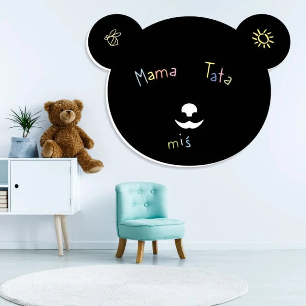 Chalkboard magnetic board for kids featuring a bear, perfect for a bright children\'s room with light walls and furniture.