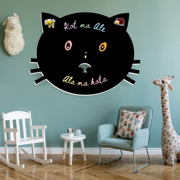 Chalkboard magnetic board for kids featuring a cat, perfect for a mint-colored children\'s room with wooden accents.